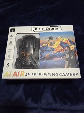 Drone AI Air 4K Self-Flying Camera - Black and Orange